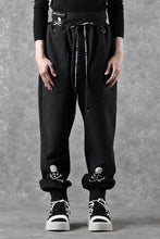 Load image into Gallery viewer, MASTERMIND WORLD x KATHARINE HAMNETT JOGGER PANTS (BLACK)