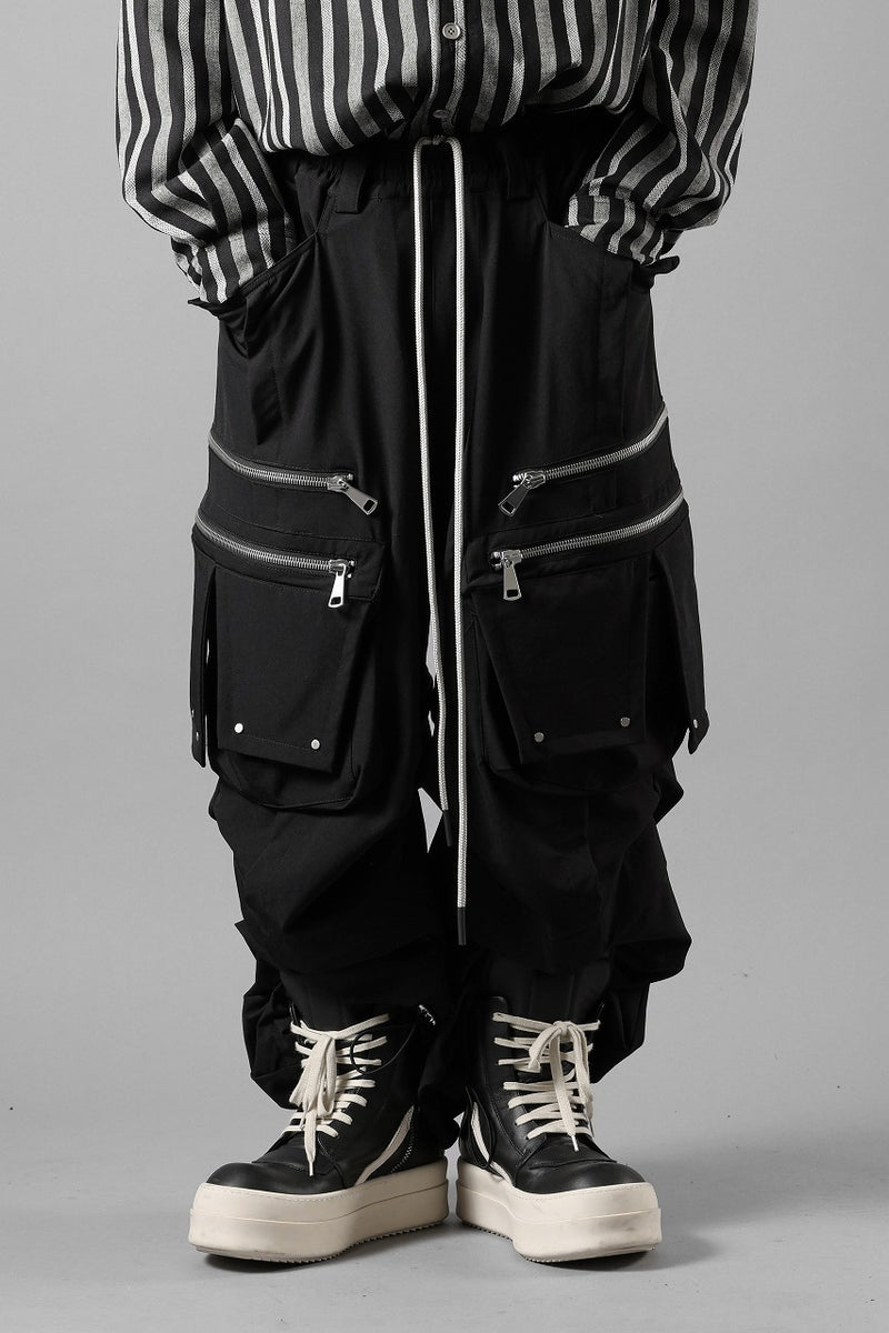 A.F ARTEFACT MULTI FLAP WIDE PANTS / TECH SMOOTH (BLACK) | エー