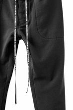 Load image into Gallery viewer, MASTERMIND WORLD x KATHARINE HAMNETT JOGGER PANTS (BLACK)