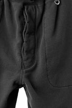 Load image into Gallery viewer, MASTERMIND WORLD x KATHARINE HAMNETT JOGGER PANTS (BLACK)