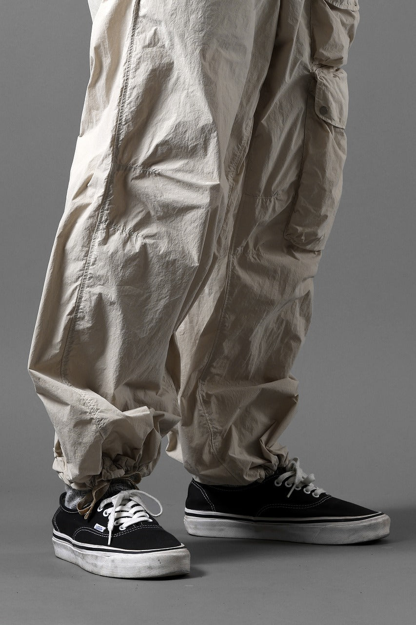 画像をギャラリービューアに読み込む, Ten c CARGO TROUSERS / GARMENT DYED LIGHT NYLON TACTEL MID LAYER (BEIGE)