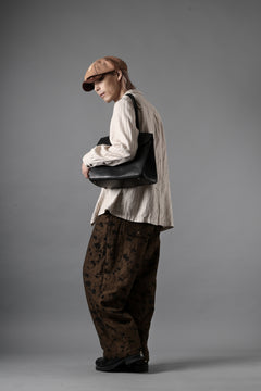 画像をギャラリービューアに読み込む, Aleksandr Manamis exclusive BUTTON LEG LOOSE PANT (BLACK / BROWN)