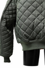 Load image into Gallery viewer, mastermind WORLD x ALPHA INDUSTRIES RIVERSIBLE MA-1 JACKET (OLIVE)