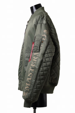 Load image into Gallery viewer, mastermind WORLD x ALPHA INDUSTRIES RIVERSIBLE MA-1 JACKET (OLIVE)