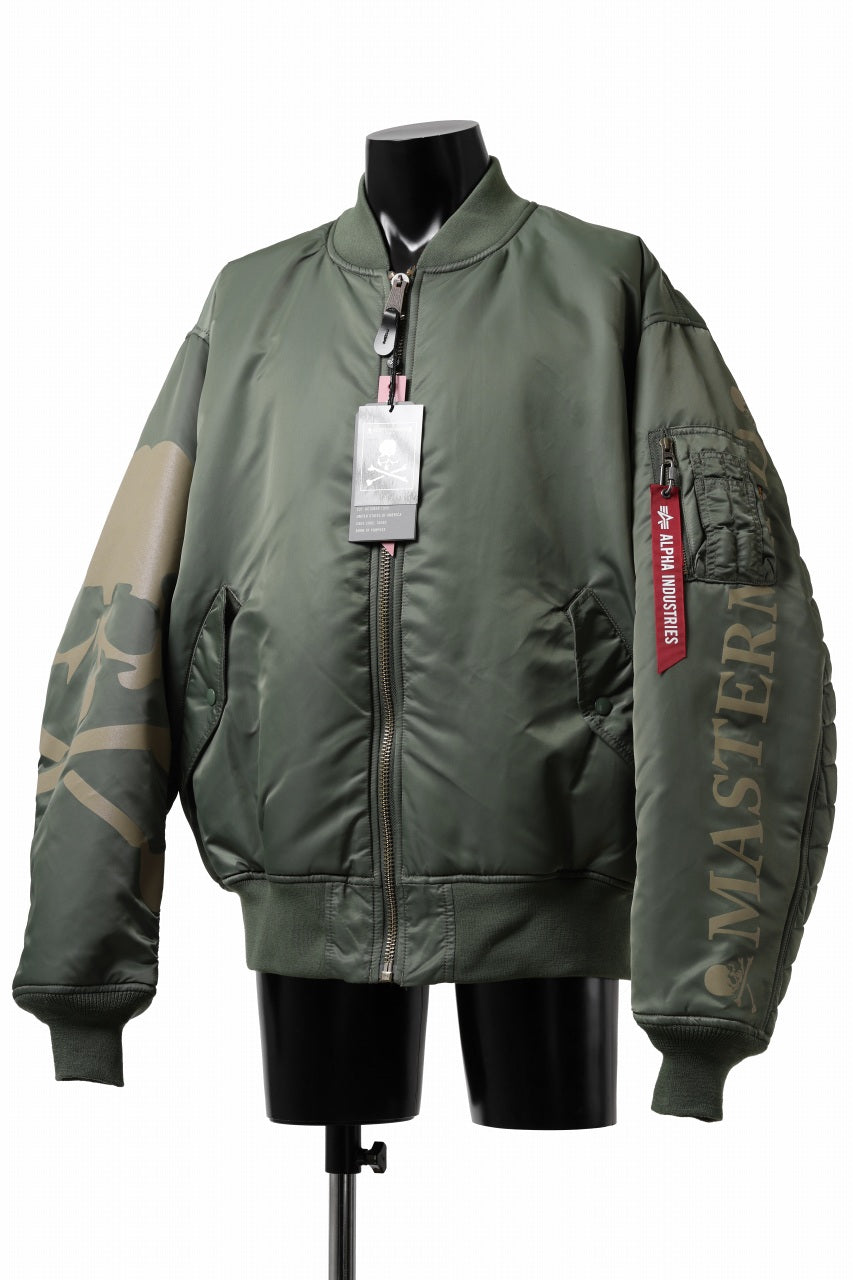 Load image into Gallery viewer, mastermind WORLD x ALPHA INDUSTRIES RIVERSIBLE MA-1 JACKET (OLIVE)