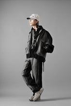 Load image into Gallery viewer, Feng Chen Wang RAW EDGE PATCHWORK TROUSERS (BLACK)
