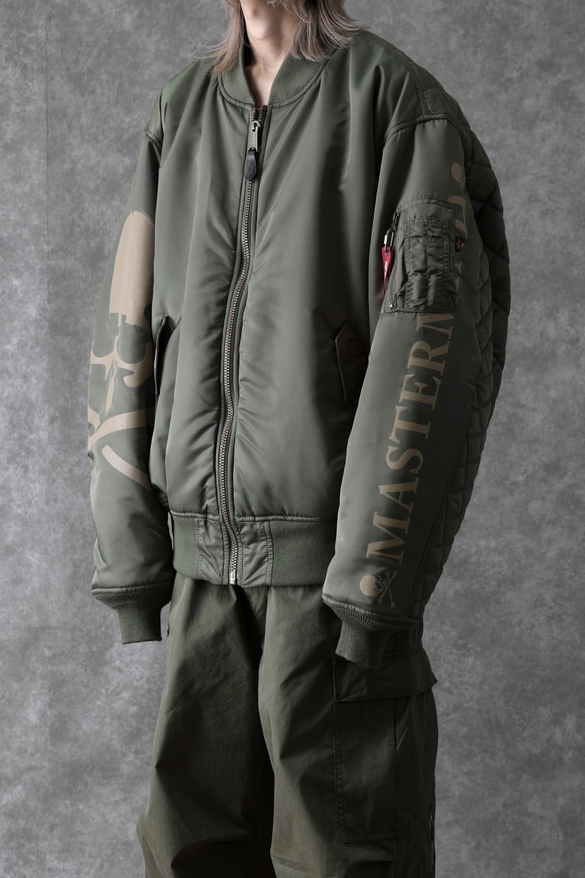 Load image into Gallery viewer, mastermind WORLD x ALPHA INDUSTRIES RIVERSIBLE MA-1 JACKET (OLIVE)