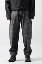 Load image into Gallery viewer, CAPERTICA PEGTOP EASY PANTS / DARK MELANGE CHECK FLANNEL (CHARCOAL)