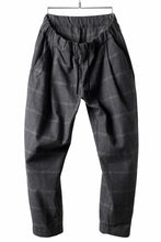 Load image into Gallery viewer, CAPERTICA PEGTOP EASY PANTS / DARK MELANGE CHECK FLANNEL (CHARCOAL)