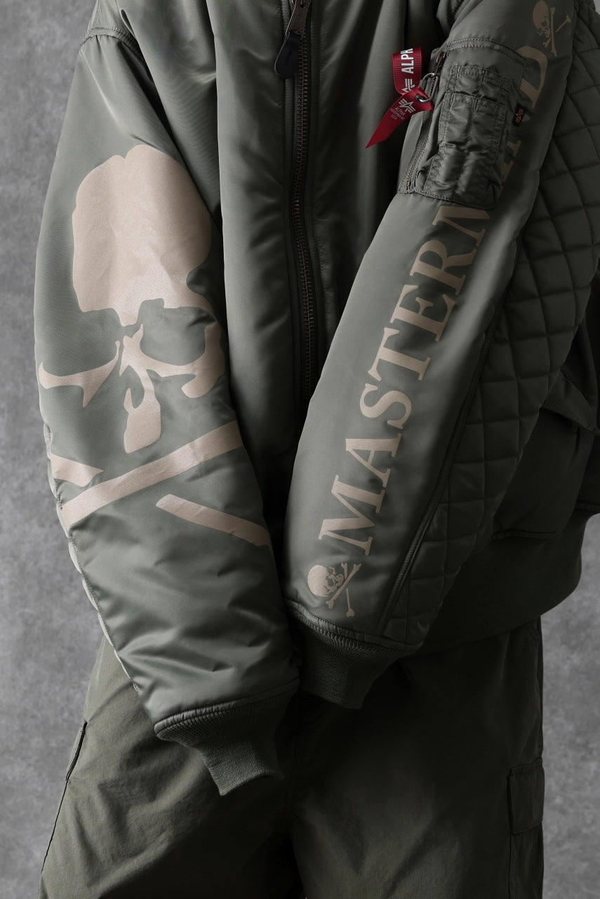 Load image into Gallery viewer, mastermind WORLD x ALPHA INDUSTRIES RIVERSIBLE MA-1 JACKET (OLIVE)