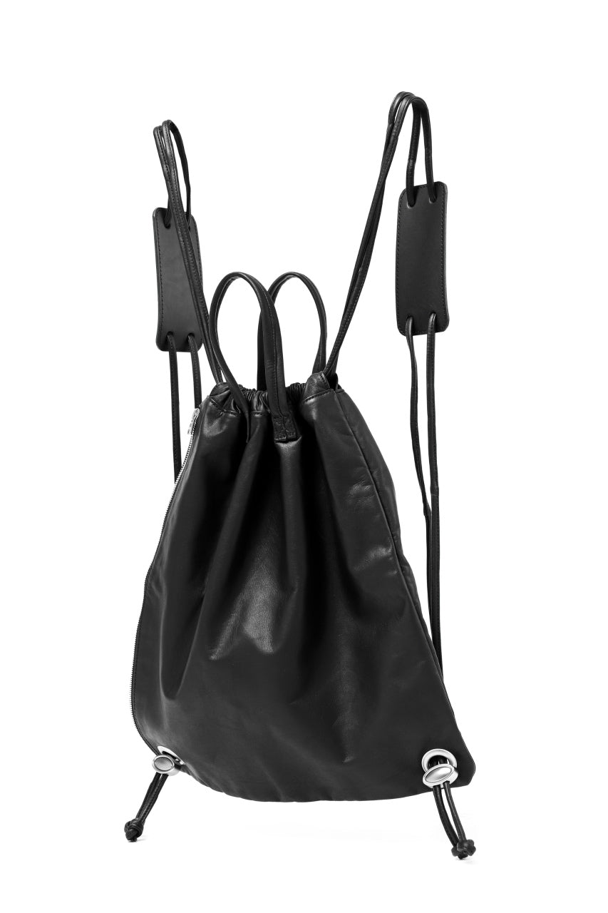 Load image into Gallery viewer, ISAMU KATAYAMA BACKLASH DRAWSTRING BACKPACK / MONOCHROME LUXURY STEER (BLACK)