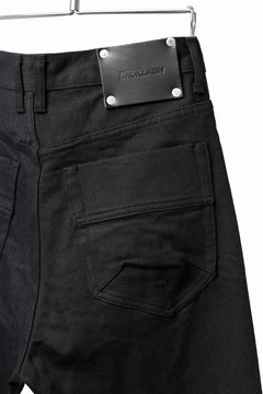 Load image into Gallery viewer, ISAMU KATAYAMA BACKLASH BLACK LEATHER KNEE PADS SLIM PANTS / "京都紋付 - 漆黒染" 13oz STRETCH DENIM (BLACK)