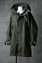 Load image into Gallery viewer, KLASICA WATER FALL MODS COAT / Ventile® UK L24 (OLIVE)