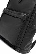 Load image into Gallery viewer, ISAMU KATAYAMA BACKLASH DRAWSTRING BACKPACK / MONOCHROME LUXURY STEER (BLACK)