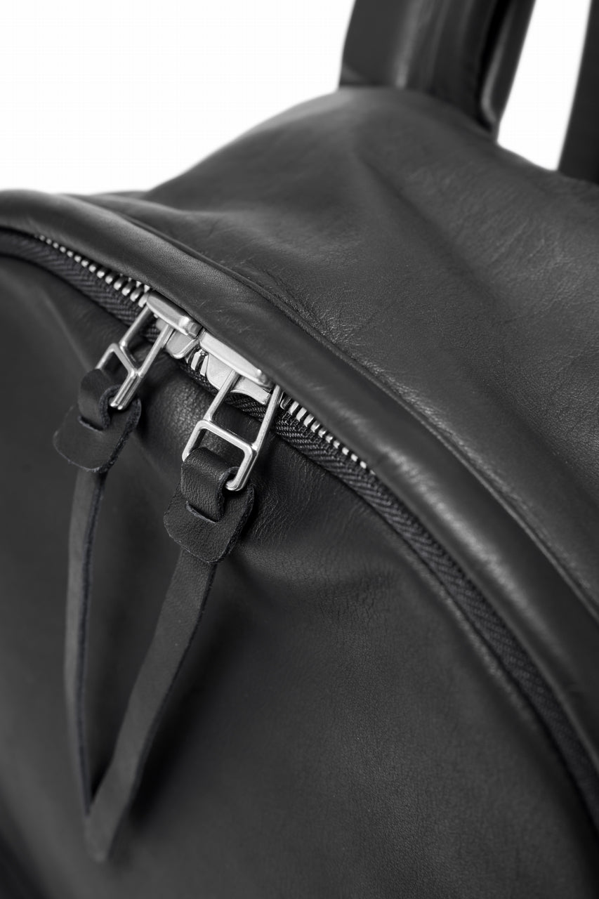 Load image into Gallery viewer, ISAMU KATAYAMA BACKLASH DRAWSTRING BACKPACK / MONOCHROME LUXURY STEER (BLACK)