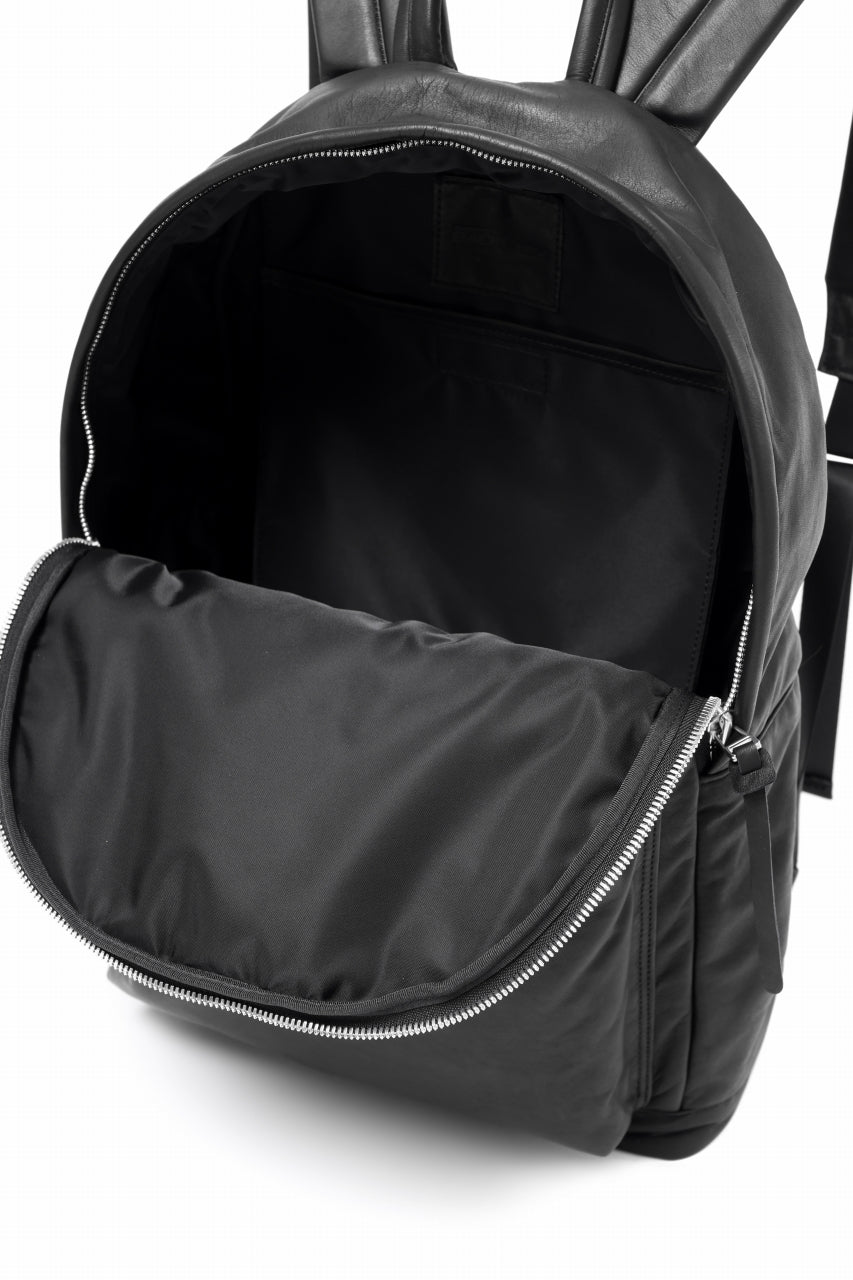 Load image into Gallery viewer, ISAMU KATAYAMA BACKLASH DRAWSTRING BACKPACK / MONOCHROME LUXURY STEER (BLACK)