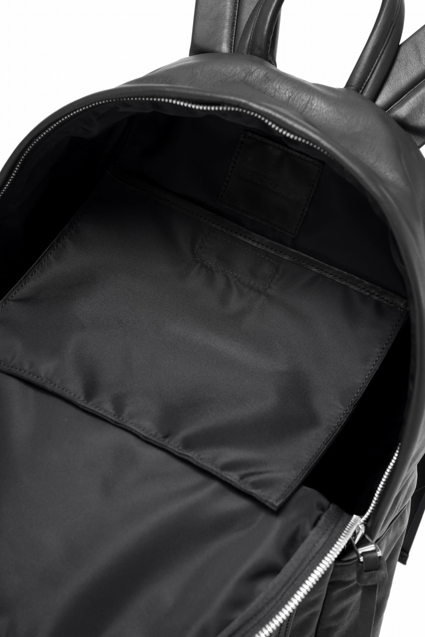 Load image into Gallery viewer, ISAMU KATAYAMA BACKLASH DRAWSTRING BACKPACK / MONOCHROME LUXURY STEER (BLACK)