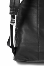 Load image into Gallery viewer, ISAMU KATAYAMA BACKLASH DRAWSTRING BACKPACK / MONOCHROME LUXURY STEER (BLACK)
