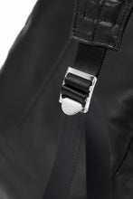 Load image into Gallery viewer, ISAMU KATAYAMA BACKLASH DRAWSTRING BACKPACK / MONOCHROME LUXURY STEER (BLACK)