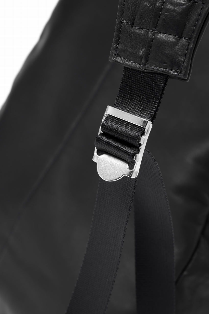 Load image into Gallery viewer, ISAMU KATAYAMA BACKLASH DRAWSTRING BACKPACK / MONOCHROME LUXURY STEER (BLACK)