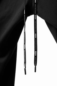 Load image into Gallery viewer, DEFORMATER.® FOLDING TUCK JOGGER PANTS / FLEECY HEAT COTTON (BLACK)