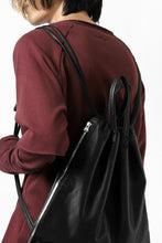 Load image into Gallery viewer, ISAMU KATAYAMA BACKLASH DRAWSTRING BACKPACK / MONOCHROME LUXURY STEER (BLACK)
