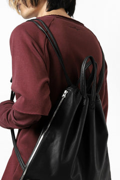 Load image into Gallery viewer, ISAMU KATAYAMA BACKLASH DRAWSTRING BACKPACK / MONOCHROME LUXURY STEER (BLACK)