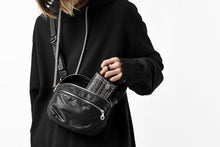 Load image into Gallery viewer, ISAMU KATAYAMA BACKLASH STRAP ZIP BAG / MONOCHROME LUXURY STEER (BLACK)