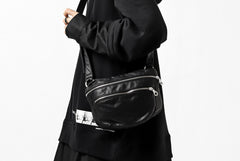 Load image into Gallery viewer, ISAMU KATAYAMA BACKLASH STRAP ZIP BAG / MONOCHROME LUXURY STEER (BLACK)