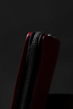 Load image into Gallery viewer, ISAMU KATAYAMA BACKLASH exclusive ROUND FASTNER WALLET / DOUBLE-SHOULDER OBJECT DYED (RED)