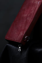 Load image into Gallery viewer, ISAMU KATAYAMA BACKLASH exclusive ROUND FASTNER WALLET / DOUBLE-SHOULDER OBJECT DYED (RED)