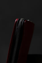 Load image into Gallery viewer, ISAMU KATAYAMA BACKLASH exclusive ROUND FASTNER WALLET / DOUBLE-SHOULDER OBJECT DYED (RED)