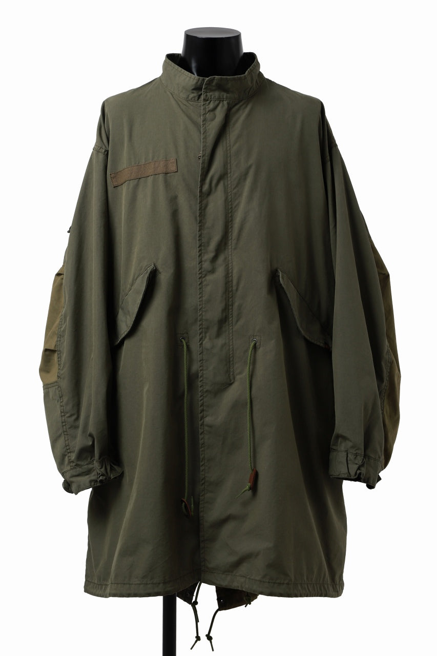 Load image into Gallery viewer, mastermind WORLD x ALPHA INDUSTRIES M-65 MODS COAT - CRAZY PANELED (OLIVE)