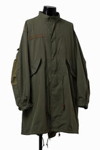 Load image into Gallery viewer, mastermind WORLD x ALPHA INDUSTRIES M-65 MODS COAT - CRAZY PANELED (OLIVE)