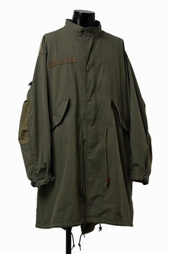 Load image into Gallery viewer, mastermind WORLD x ALPHA INDUSTRIES M-65 MODS COAT - CRAZY PANELED (OLIVE)