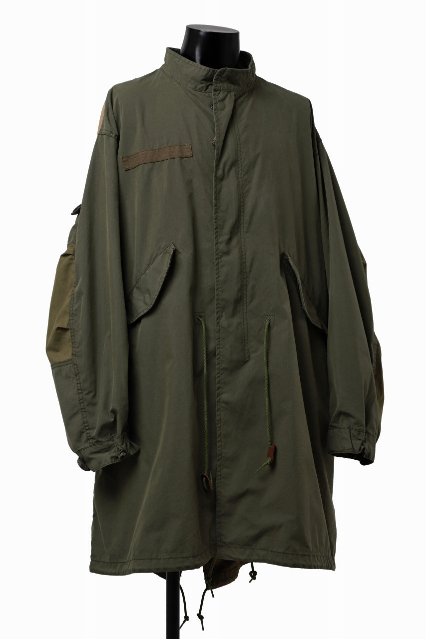 Load image into Gallery viewer, mastermind WORLD x ALPHA INDUSTRIES M-65 MODS COAT - CRAZY PANELED (OLIVE)