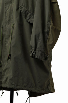 Load image into Gallery viewer, mastermind WORLD x ALPHA INDUSTRIES M-65 MODS COAT - CRAZY PANELED (OLIVE)