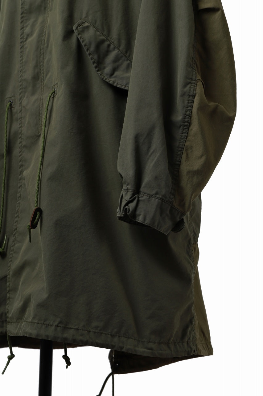 Load image into Gallery viewer, mastermind WORLD x ALPHA INDUSTRIES M-65 MODS COAT - CRAZY PANELED (OLIVE)