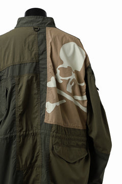 Load image into Gallery viewer, mastermind WORLD x ALPHA INDUSTRIES M-65 MODS COAT - CRAZY PANELED (OLIVE)
