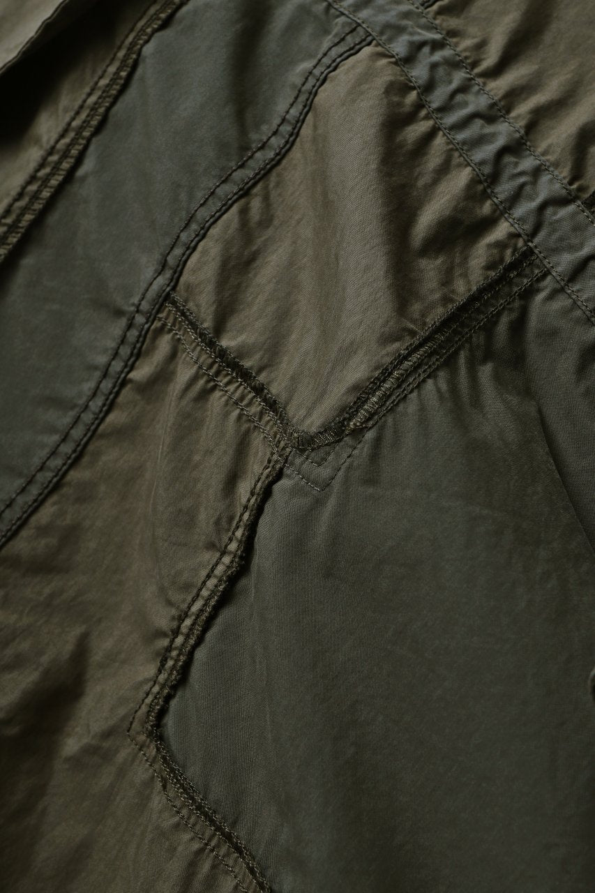 Load image into Gallery viewer, mastermind WORLD x ALPHA INDUSTRIES M-65 MODS COAT - CRAZY PANELED (OLIVE)
