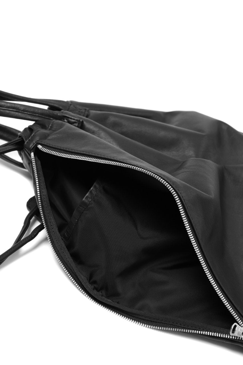 Load image into Gallery viewer, ISAMU KATAYAMA BACKLASH DRAWSTRING BACKPACK / MONOCHROME LUXURY STEER (BLACK)