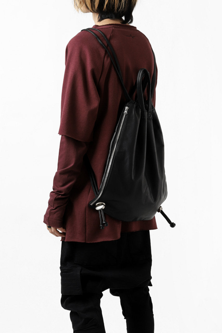 Load image into Gallery viewer, ISAMU KATAYAMA BACKLASH DRAWSTRING BACKPACK / MONOCHROME LUXURY STEER (BLACK)
