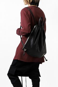Load image into Gallery viewer, ISAMU KATAYAMA BACKLASH DRAWSTRING BACKPACK / MONOCHROME LUXURY STEER (BLACK)
