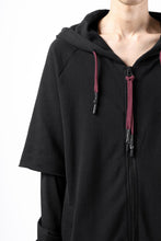 Load image into Gallery viewer, FIRST AID TO THE INJURED HOODY LAYERED SLEEVE ZIP PARKA / FRENCH TERRY + JERSEY (BLACK)