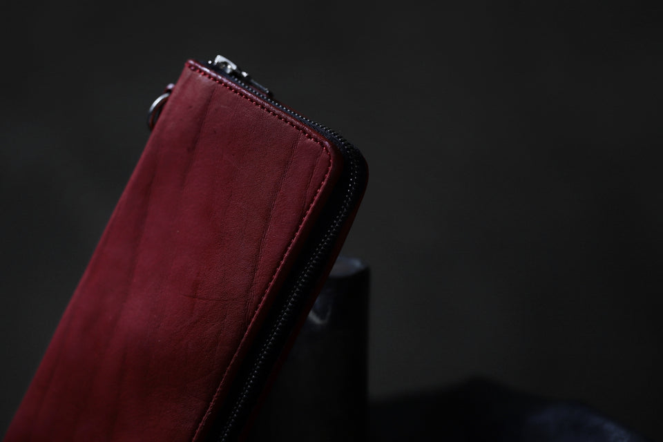 Load image into Gallery viewer, ISAMU KATAYAMA BACKLASH exclusive ROUND FASTNER WALLET / DOUBLE-SHOULDER OBJECT DYED (RED)