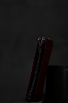 Load image into Gallery viewer, ISAMU KATAYAMA BACKLASH exclusive ROUND FASTNER WALLET / DOUBLE-SHOULDER OBJECT DYED (RED)