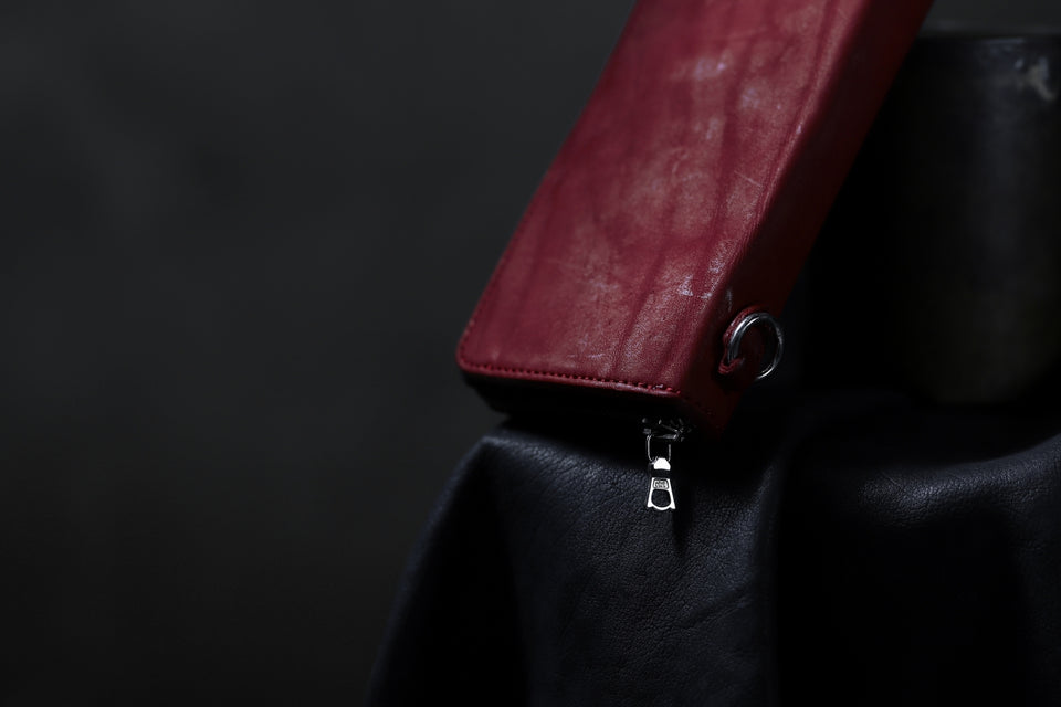 Load image into Gallery viewer, ISAMU KATAYAMA BACKLASH exclusive ROUND FASTNER WALLET / DOUBLE-SHOULDER OBJECT DYED (RED)