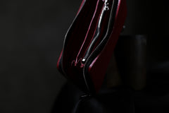 Load image into Gallery viewer, ISAMU KATAYAMA BACKLASH exclusive ROUND FASTNER WALLET / DOUBLE-SHOULDER OBJECT DYED (RED)