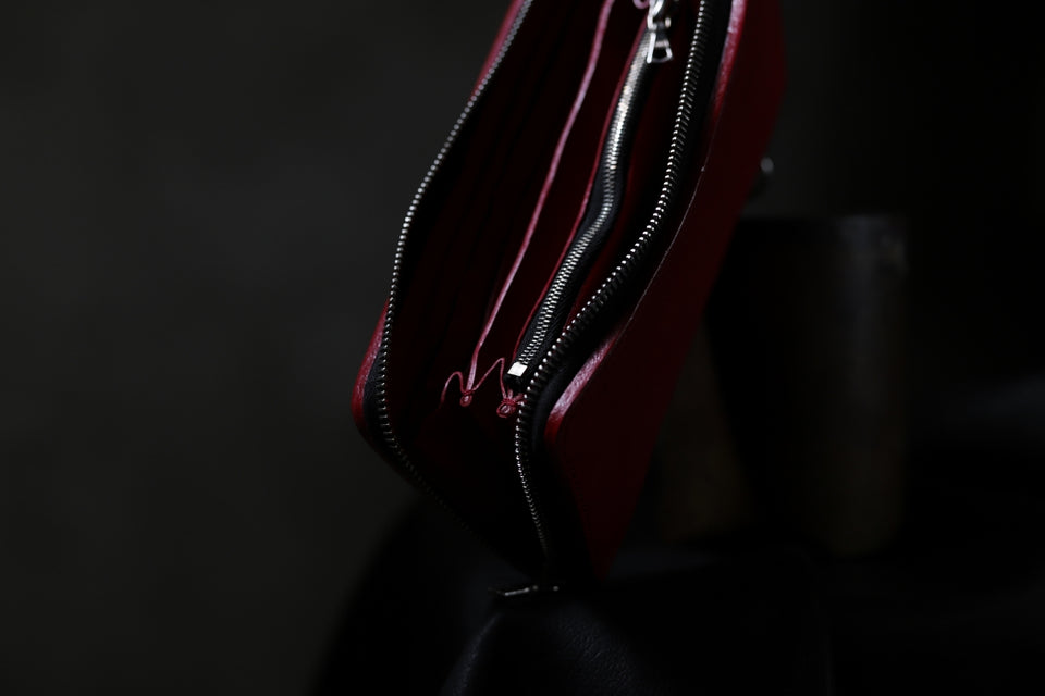 Load image into Gallery viewer, ISAMU KATAYAMA BACKLASH exclusive ROUND FASTNER WALLET / DOUBLE-SHOULDER OBJECT DYED (RED)