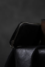Load image into Gallery viewer, ISAMU KATAYAMA BACKLASH exclusive ROUND FASTNER WALLET / DOUBLE-SHOULDER OBJECT DYED (BLACK)
